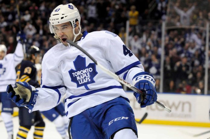 Toronto Maple Leafs center Nazem Kadri celebrates a goal against the Buffalo Sabres during the first period of their NHL hockey game in Buffalo