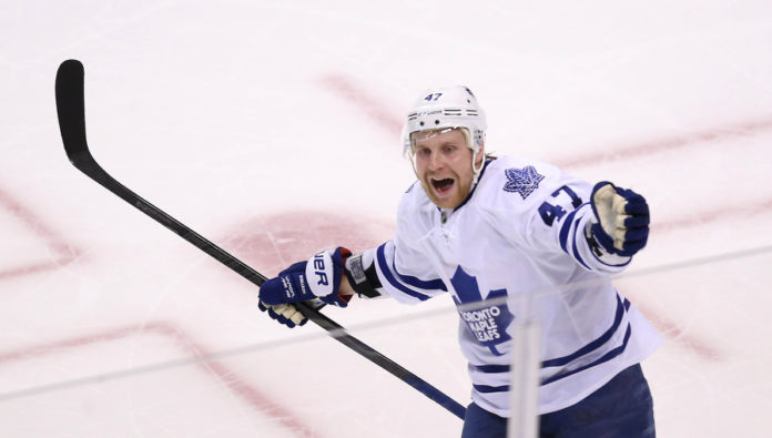 Toronto Maple Leafs Leo Komarov celebrates after Tyler Bozak scores a shorthanded goal