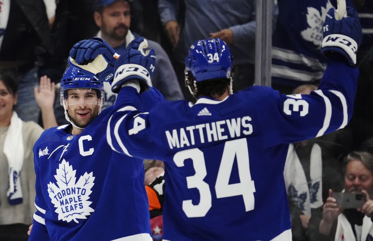 Auston Matthews of the Toronto Maple Leafs warms up in an