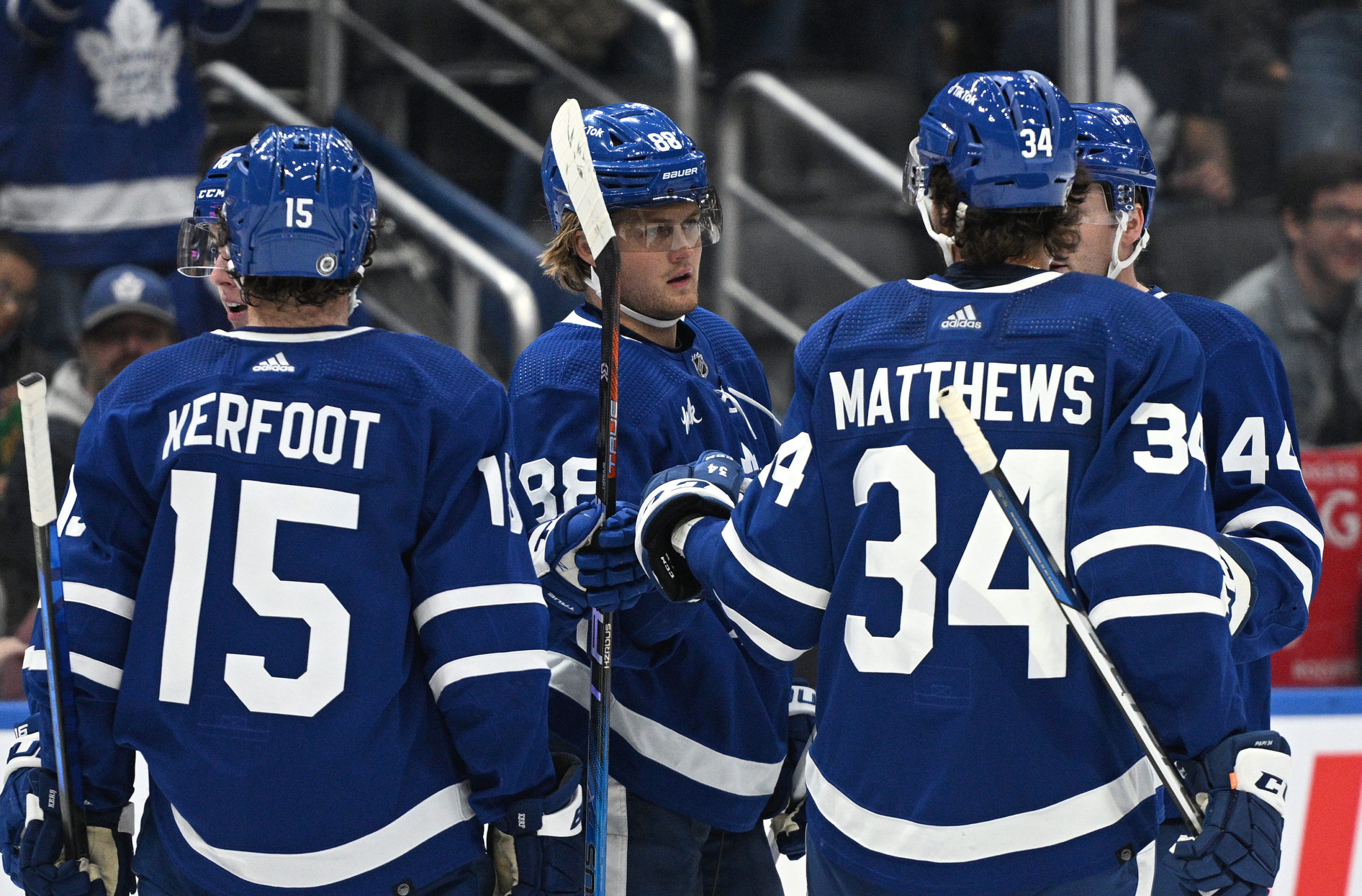 Toronto Maple Leafs players line up for the Canadian national anthem before  playing against the Buffalo Sabres in the NHL Heritage Classic hockey game  in Hamilton, Ontario, on Sunday, March 13, 2022. (